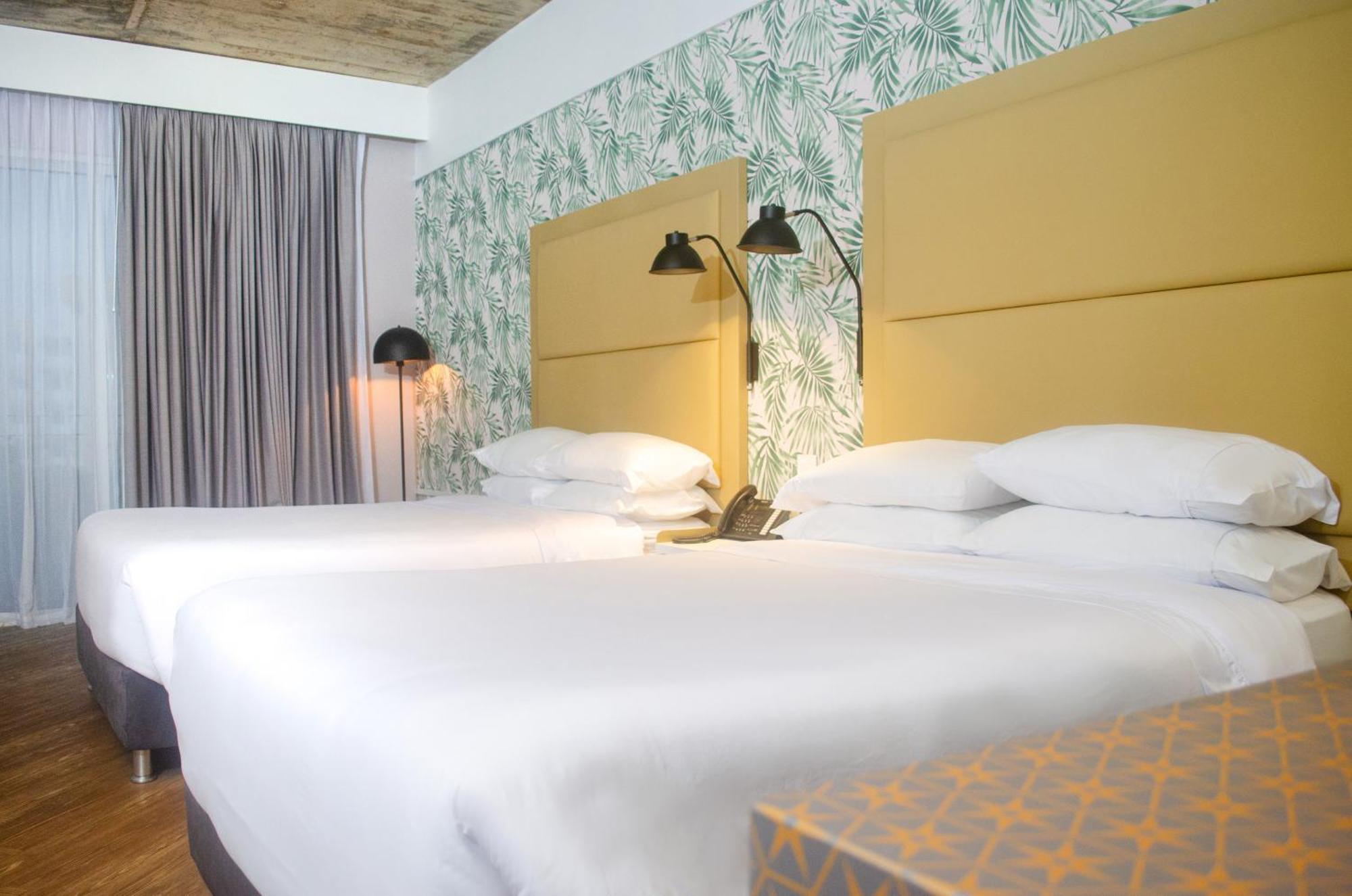 Отель Faranda Collection Barranquilla, A Member Of Radisson Individuals Барранкилья Экстерьер фото A room at the hotel
